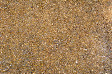 Background and texture made from colored stones pebbles and sand.