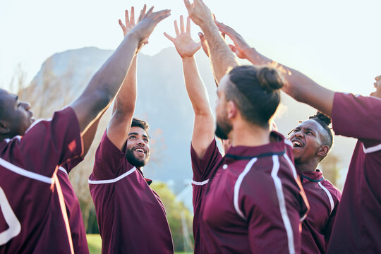 Raised hands, sports and excited people, rugby team building and solidarity support, teamwork or cooperation. Motivation, group celebration cheers and excited player smile for athlete challenge