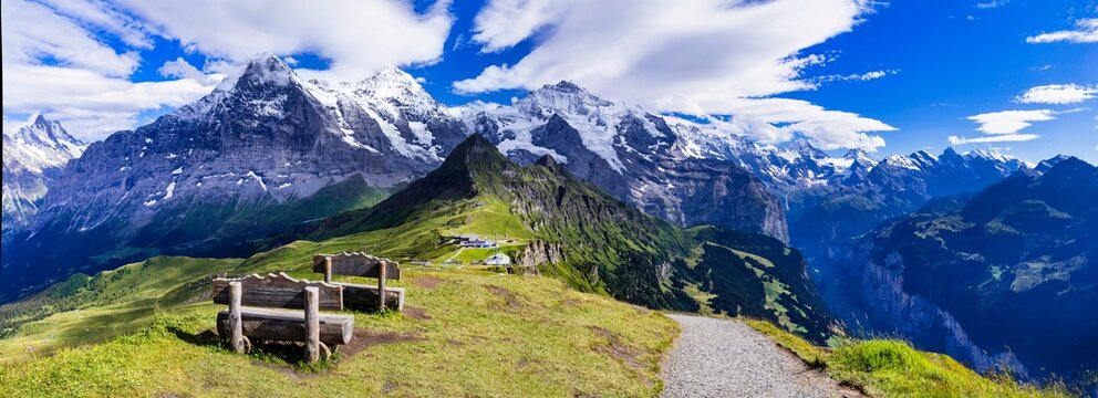 Swiss nature scenery. Scenic snowy Alps mountains Beauty in nature. Switzerland landscape. View of Mannlichen mountain and famous hiking route "Royal road"