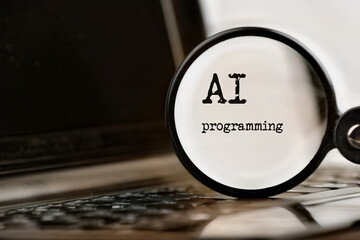 AI programming technology demonstrated with laptop, text and magnifying glass and command prompt....
