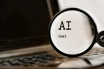 AI chat technology demonstrated with laptop, text and magnifying glass and command prompt. Chat with artificial intelligence. - obrazy, fototapety, plakaty