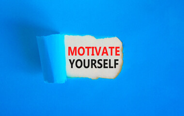 Motivate yourself symbol. Concept words Motivate yourself on beautiful white paper. Beautiful blue paper background. Business psychology motivate yourself concept. Copy space.