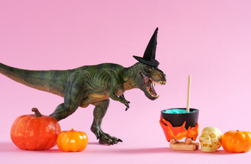 Cute  dinosaurs wearing witch hat is brewing potion in pot on  pink