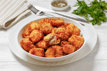 crispy fried panko breaded chicken bites in bowl