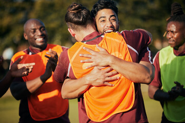 Fototapeta premium Hug, sports and rugby team celebrate teamwork, achievement or winning game, match or tournament competition. Embrace, group winner celebration and men happy, excited or applause for challenge success