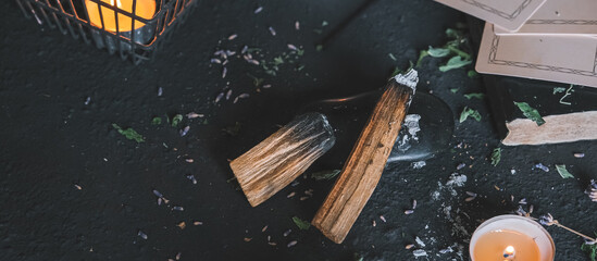 Esoteric, Occult mystical ritual scene of sorcery tarot candles, dried flowers, palo santo and...