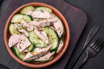 Delicious juicy fresh salad of cucumbers and grilled chicken slices, with french mustard
