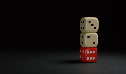 Stacked Dice with Red Base on Dark Background 3D illustration