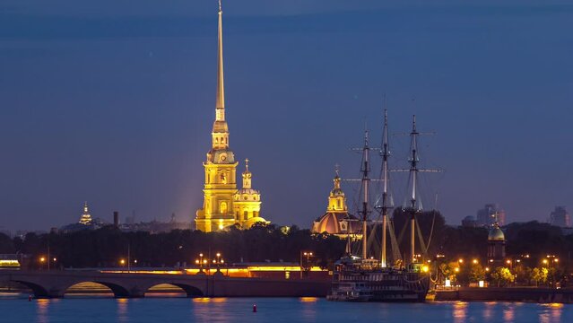 Peter and Paul Fortress after sunset, founded by Peter the Great in 1703, transitions from day to night in this timelapse. Located in St. Petersburg, Russia