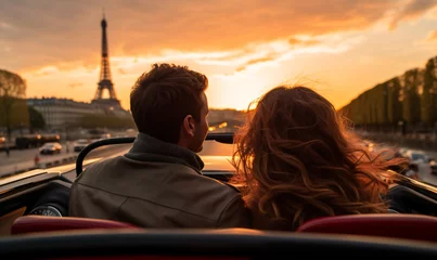 Fotobehang Parijs Happy smiling couple man and woman traveling in car convertible the Paris France on a summer day at sunset