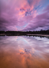 Sunset over Ulster Heights Lake in Ellenville, New York.