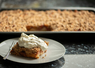 Gluten and sugar-free plum cake with crumble,with cream