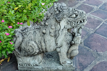 An ancient East Asian decorative statue of a mythical creature.