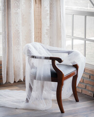 Chair in a room illuminated with natural light.
