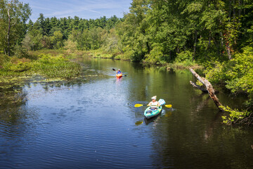 Kayaking on the Bantam River in the White Memorial Foundation nature preserve, Litchfield,...