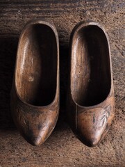 antique madreñas or traditional clogs, spanish wooden shoes from Galicia usted in agriculture