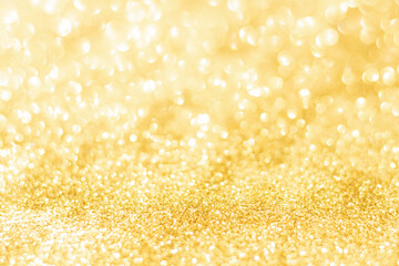 Gold glitter defocused texture background. gold christmas abstract background.