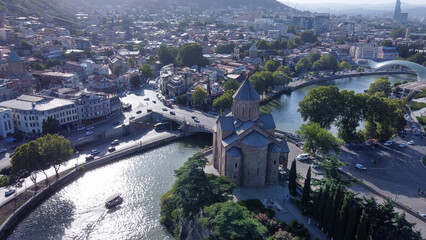 Fantastic view on Kura river , Metkhi Bridge , Metekhi Cathedral and old town of Tboilisi - drone point of  view © Marat Lala