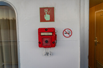 emergency fire alarm button on the ship. 