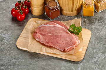 Raw pork schnitzel for cooking