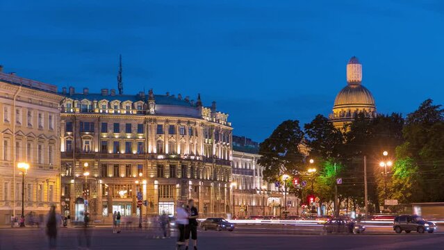 View of Saint Isaac's Cathedral timelapse from Palace Square with Traffic in Saint Petersburg, Russia. The City's Largest Cathedral, Completed in 1858, Shines Amidst the Night