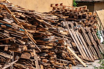 a pile of discarded wooden boards