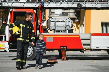 Protect people from dangerous with brave heart.Hero in fireman with uniform safe children from burn smoke