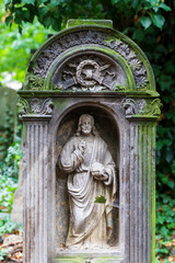 Historic Statue on the mystery old Prague Cemetery, Czech Republic