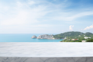 Obraz premium empty marble top on the background of the island, mountain and blue sky for product display