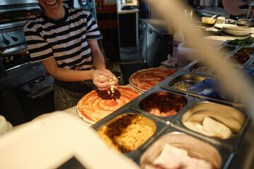 Young Woman Working at Pizzeria Restaurant
