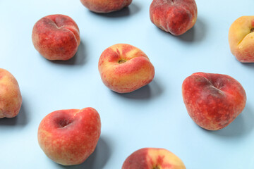 Sweet fig peaches on blue background