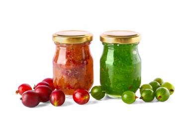 Jars with tasty gooseberry jam on white background
