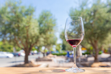 Close up shot of a glass of red wine
