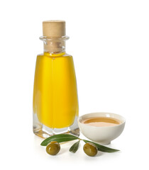 Bottle and bowl of fresh olive oil on white background