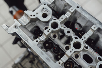 Cylinder head of car under repair