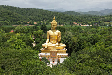 Luang Pho To, Wat Pha Thang, is a Buddha image enshrined outdoors in the Prathanphon posture. It is installed prominently and can be observed from a distance. It is believed that is very sacred. 