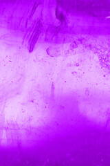 The texture is abstract purple color. Vertical photo. Closeup