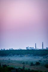 Fototapeta na wymiar power station at sunset