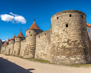 Fototapeta na wymiar Large stone towers in Tallinn, medieval-inspired. 