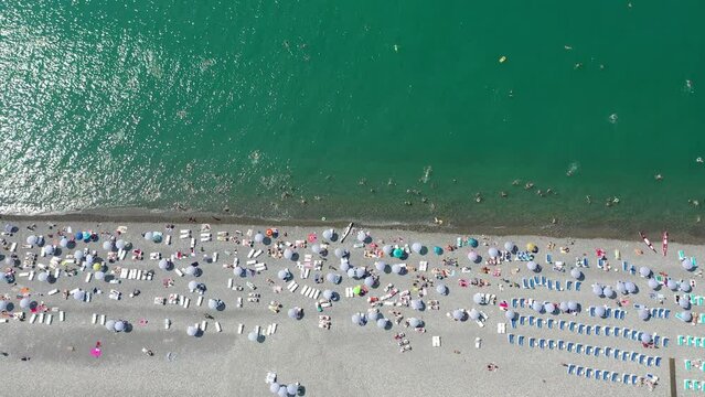 Fantastic aerial view of Batumi beach packed with tourists during summer. Batumi, Country of Georgia