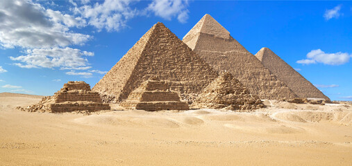 Egypt. Cairo Giza. General view of pyramids from the Giza Plateau on front side: 3 pyramids popularly known as Queens' Pyramids; next: the Pyramid of Mykerinos, Chephren and Cheops