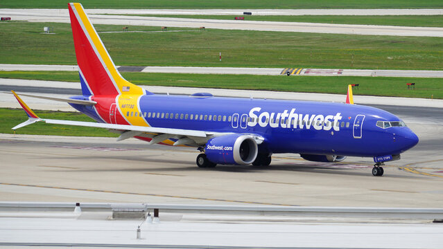 Southwest Airlines Boeing 737 plane taxies on the runway after landing at Chicago Midway International Airport.