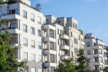 White apartment building with trees seen in Berlin, Germany - 641036990