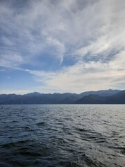Fototapeta premium There is a lot of water in the dam as far as the eye can see, like sea water.