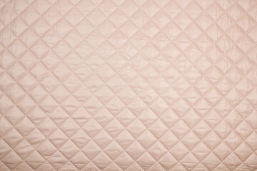 Fabric velour quilted close-up. Quilted surface upholstery