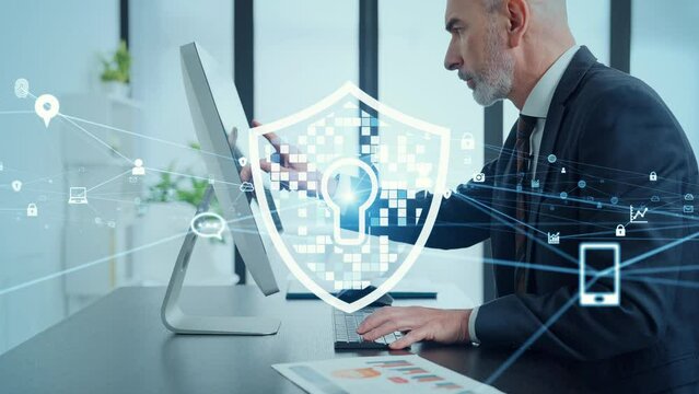 Middle aged businessman working in office and cyber security concept.