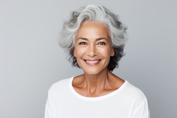 Beautiful gorgeous 50s mid age beautiful elderly senior model woman with grey hair laughing and smiling. Mature old lady close up portrait. Healthy face skin care beauty, skincare cosmetics, dental. - obrazy, fototapety, plakaty