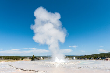 Fototapeta na wymiar Eruption of the Great Fountain Geyser in Yellowstone National park.
