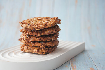 sesame sweet cookies on black background 