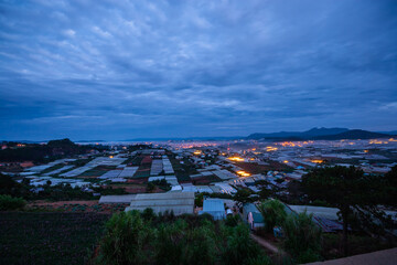Dawn on the outskirts of Da Lat, a morning with dew covering the hilltops, in the sky there are beautiful colorful fish scale clouds.